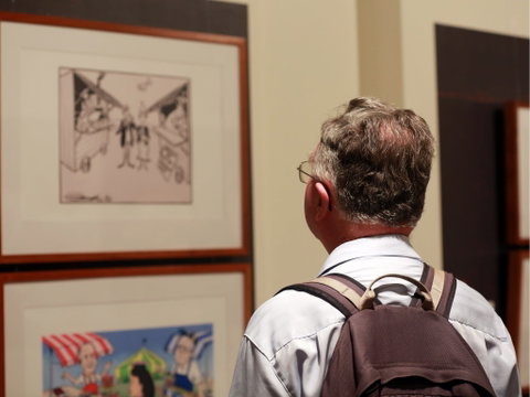 Behind The Lines: The Year's Best Political Cartoons 2019 - Darwin Tourism 1