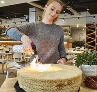 Flaming Cheese Wheel and Wine Pairing Experience - Darwin Tourism